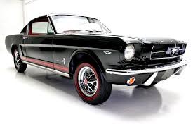 This image has an empty alt attribute; its file name is 1965-mustang.jpg